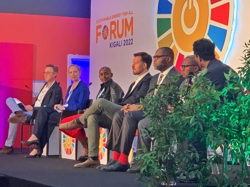 Jerome Okolo seated with fellow panellists on the clean-cooking panel at the SEforALL Global Forum, Kigali 2022